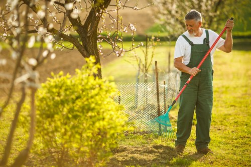 Inspector documenting a completed garden job